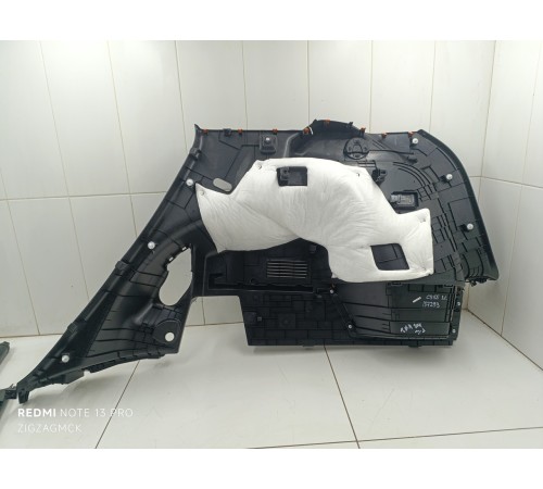 Обшивка багажника левая