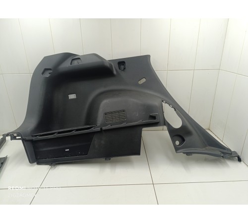 Обшивка багажника левая