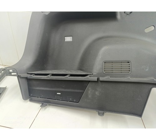 Обшивка багажника левая