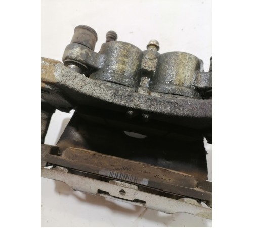 Суппорт тормозной передний левый