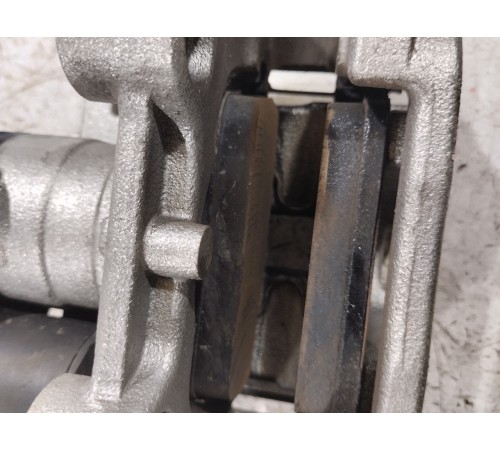 Суппорт тормозной задний левый