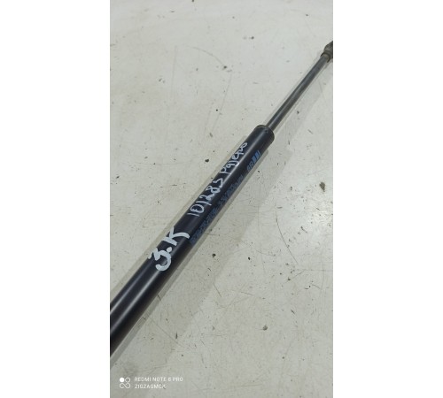 Амортизатор крышки багажника (задний, левый)