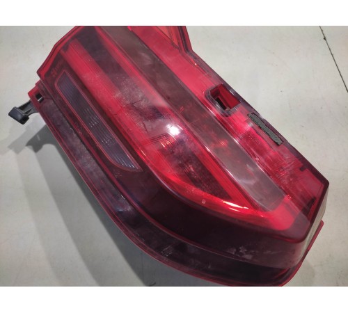 Фонарь крышки багажника левый