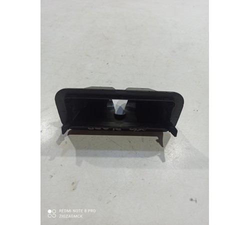 Кожух (накладка) замка багажника