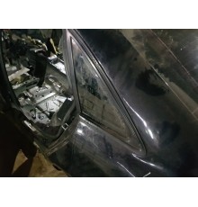 Стекло заднее задн. лев.