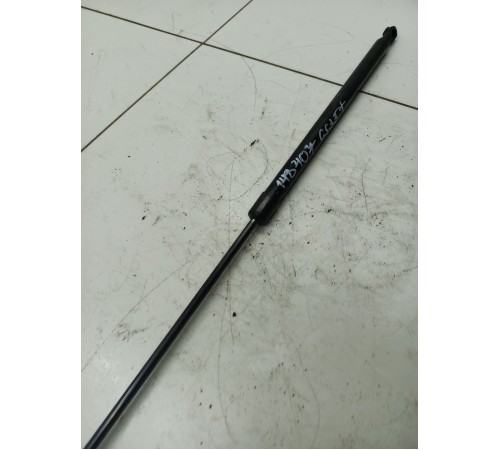 Амортизатор двери крышки багажника левый