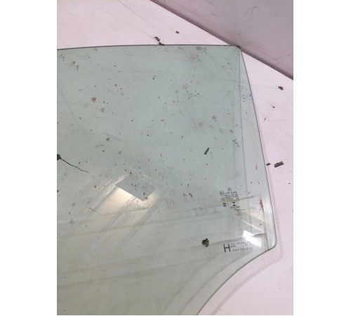 Стекло двери переднее левое