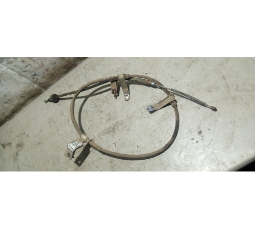 Трос стояночного тормоза левый