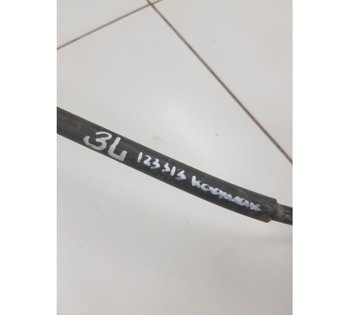 Трос стояночного тормоза левый