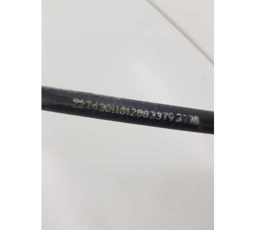 Трос стояночного тормоза левый