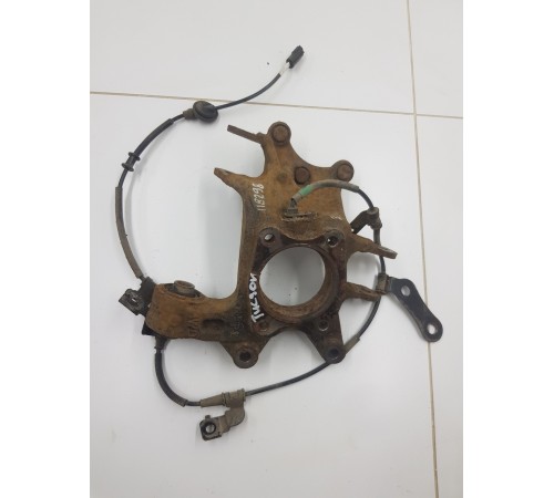 Кулак поворотный задний левый