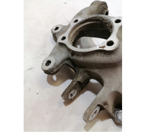 Кулак поворотный задний левый