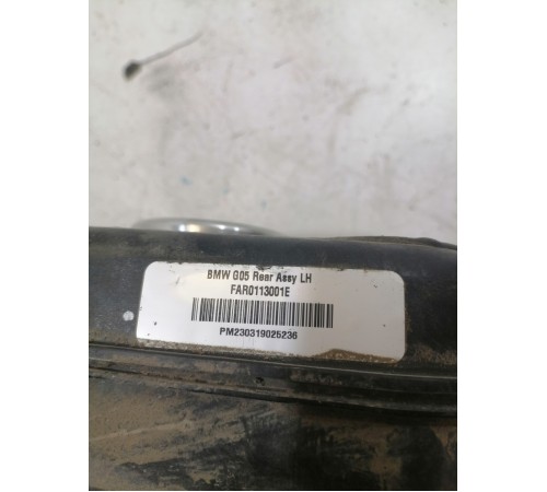 Амортизатор подвески задний левый в сборе