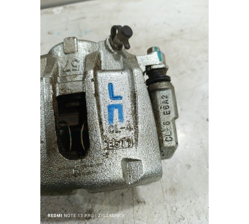 Суппорт тормозной передний левый