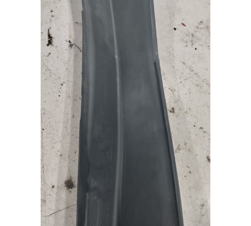 Обшивка стойки багажника левая