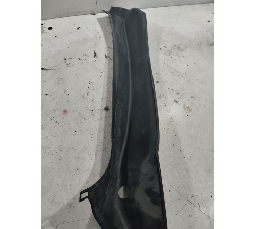 Обшивка стойки багажника левая
