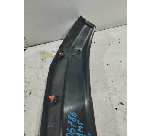Обшивка стойки багажника левая