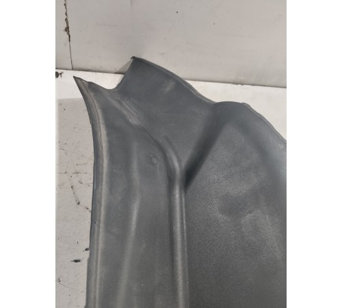 Обшивка стойки багажника левая