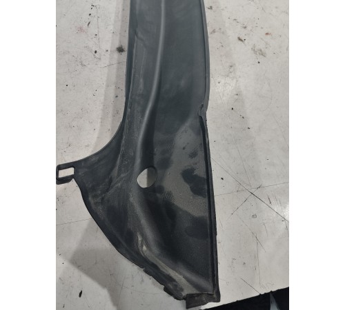 Обшивка стойки багажника левая