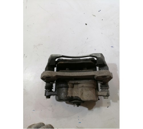 Суппорт тормозной передний левый