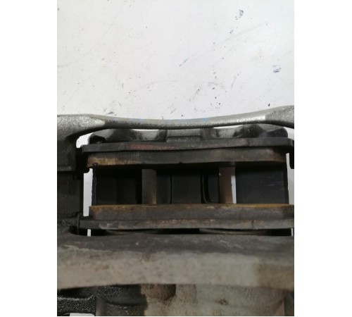 Суппорт тормозной передний левый