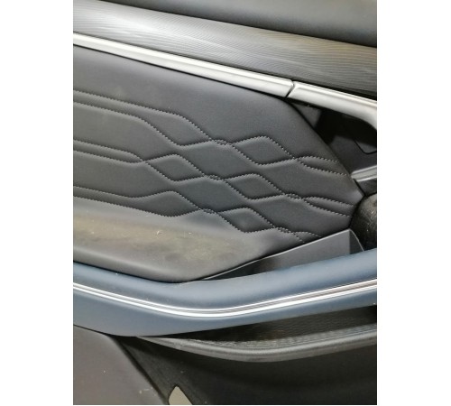 Обшивка двери передняя левая