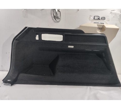 Обшивка багажника (задняя левая)