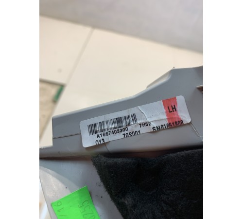 Обшивка крышки багажника (левая)