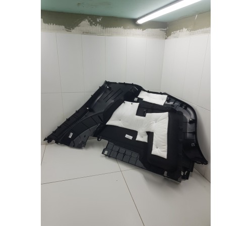 Обшивка багажника левая