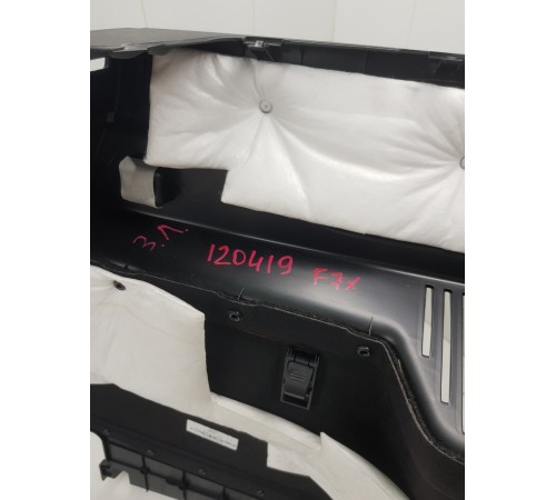 Обшивка багажника левая