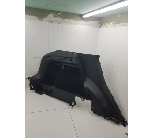 Обшивка багажника левая