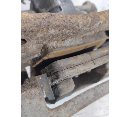 Суппорт тормозной задний левый