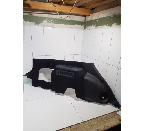 Обшивка багажника левая