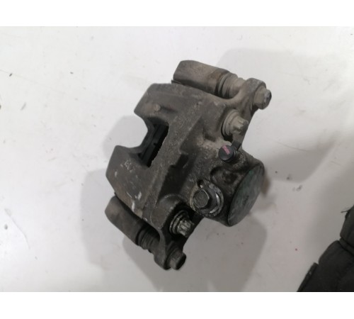 Суппорт тормозной задний левый