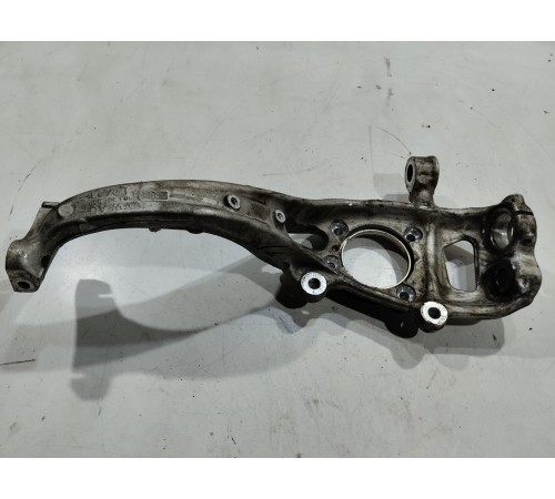 Кулак поворотный передний левый