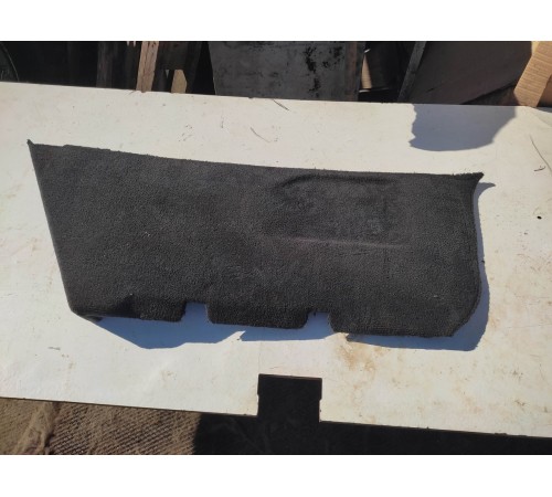 Обшивка багажника левая