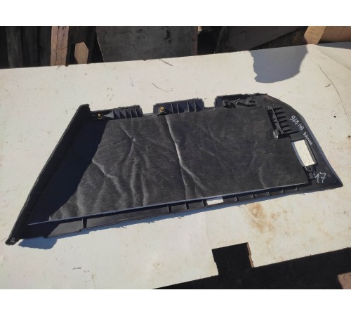 Обшивка багажника левая