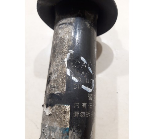 Амортизатор подвески передний левый