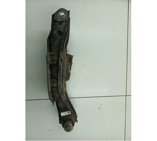 Рычаг задний левый нижний