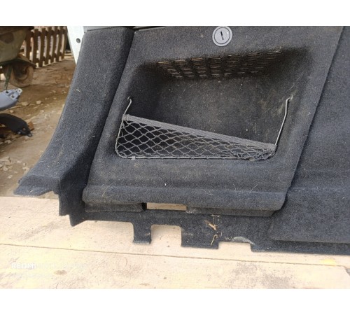 Обшивка багажника левая