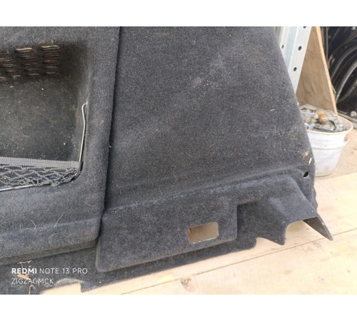 Обшивка багажника левая