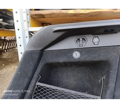 Обшивка багажника левая