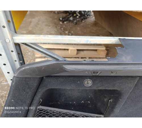 Обшивка багажника левая