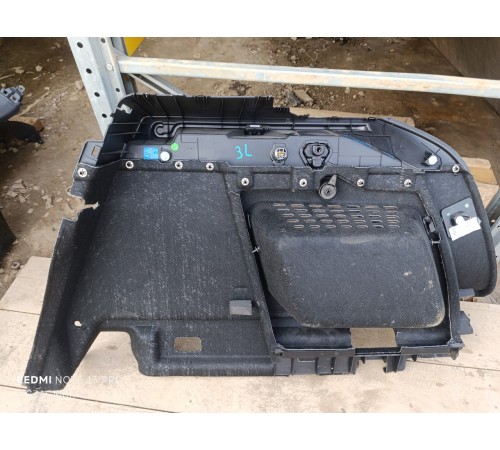 Обшивка багажника левая