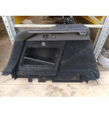 Обшивка багажника левая