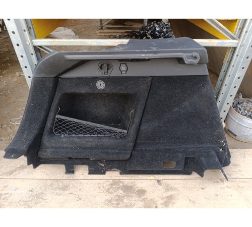 Обшивка багажника левая