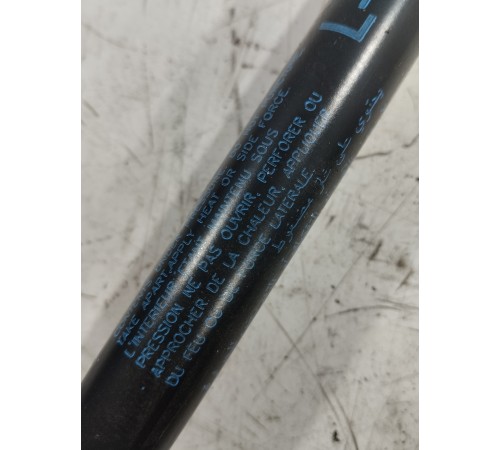 Амортизатор крышки багажника левый