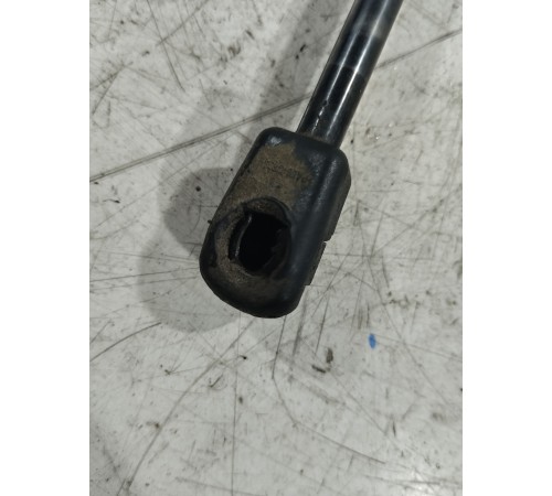 Амортизатор крышки багажника левый