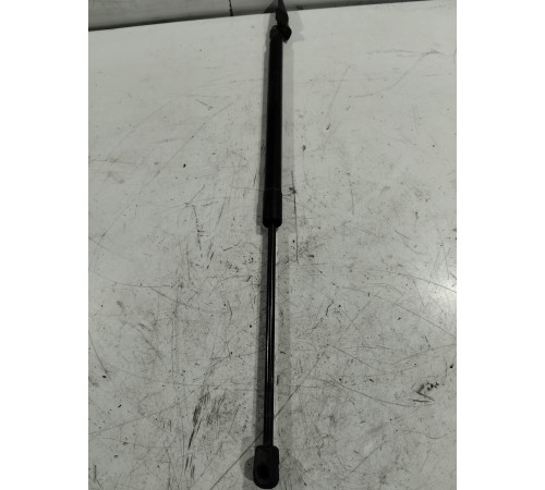 Амортизатор крышки багажника левый