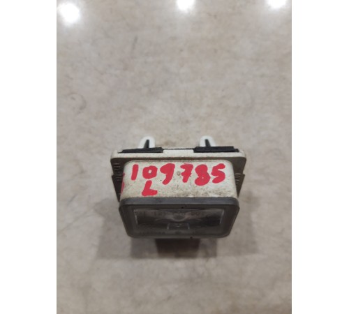 Плафон подсветки номера левый